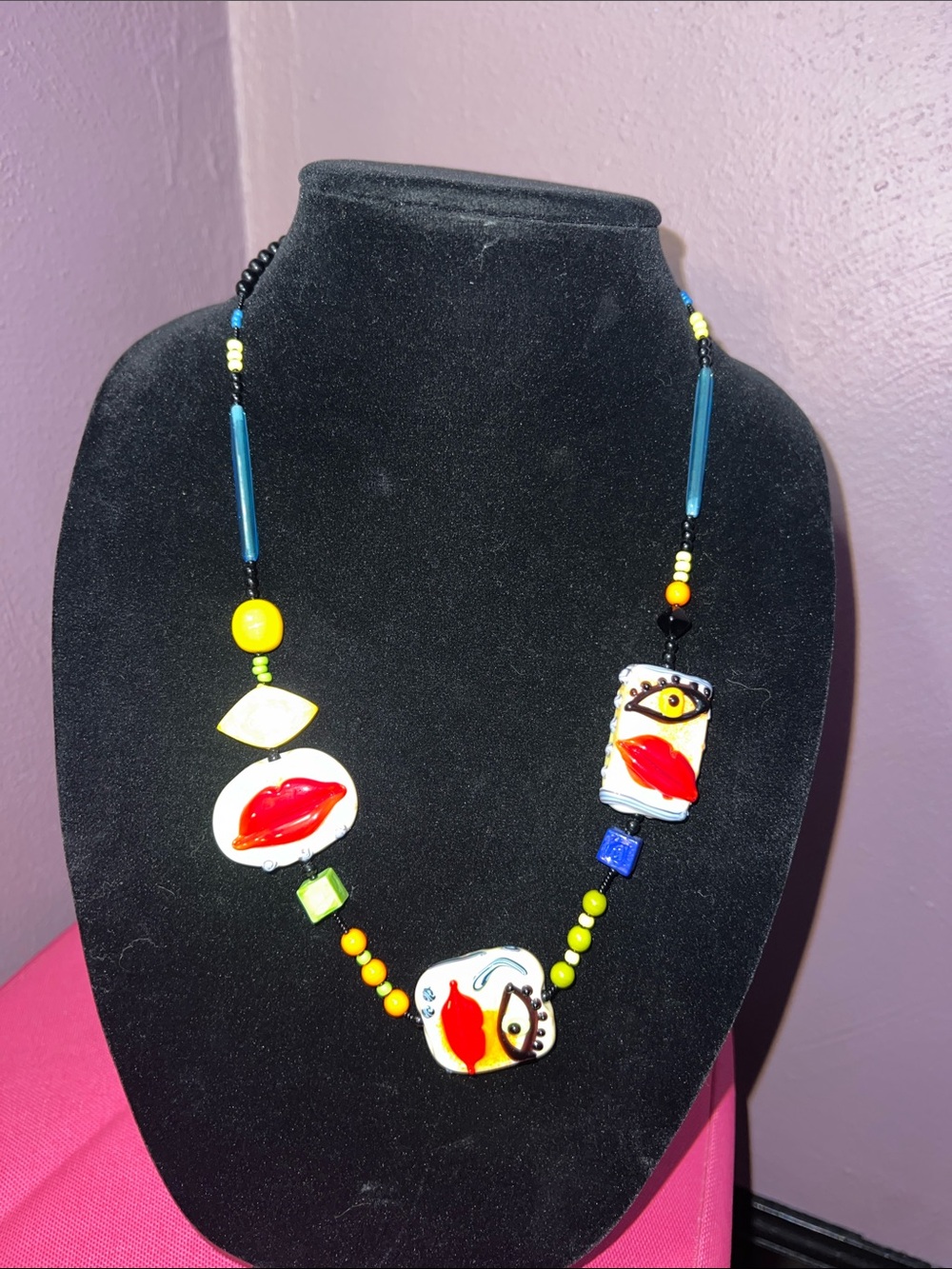 Paola Multicolor Glass Pendant Necklace with Red Accent Lips and eyes
